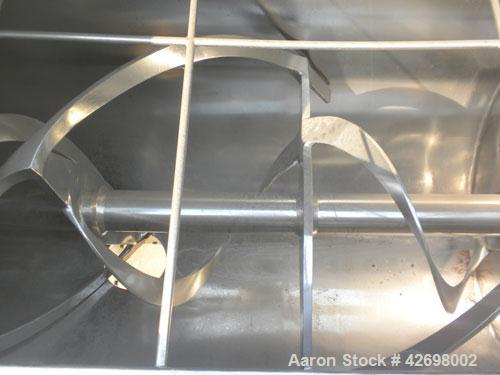 Used American Process Double Spiral Ribbon Blender, Model DRB24, 24 Cubic Feet Working Capacity, 301 Stainless Steel. Non-jacketed trough 26" wide x 66" long x approximately 29" deep. 3" Diameter sha...