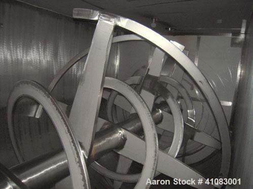 Used American Process Double Spiral Ribbon Blender, Model DRB-325, 325 cubic feet working capacity, 304 stainless steel. Dimple jacketed trough 66" wide x 144" long x approximately 73" deep, rated 14...