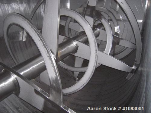 Used American Process Double Spiral Ribbon Blender, Model DRB-325, 325 cubic feet working capacity, 304 stainless steel. Dimple jacketed trough 66" wide x 144" long x approximately 73" deep, rated 14...