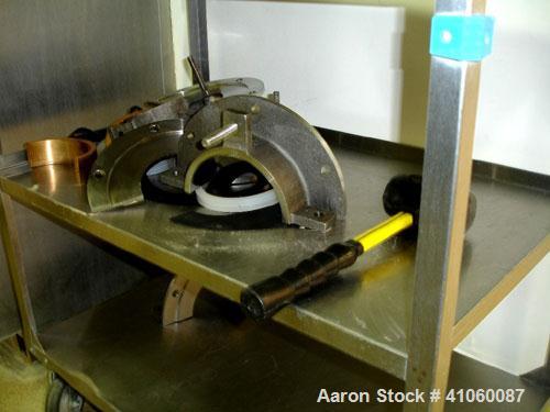 Used Areco Ribbon Blender, 125 cubic feet, stainless steel construction. 48" wide x 120" long trough, double ribbon, outboard roller bearings, air purge seals, jacketed trough, chain and sprocket dri...
