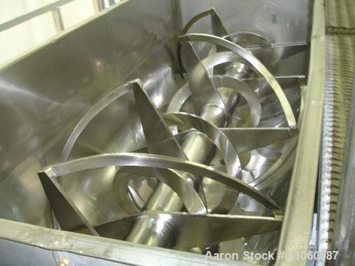 Used Areco Ribbon Blender, 125 cubic feet, stainless steel construction. 48" wide x 120" long trough, double ribbon, outboard roller bearings, air purge seals, jacketed trough, chain and sprocket dri...