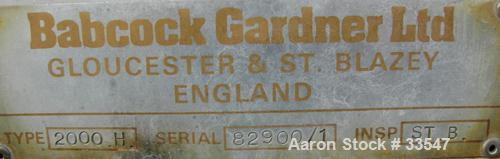Used Babcock Gardner Interrupted Double Spiral Ribbon Blender, Model 2000H. 98 Cubic foot working capacity, 304 stainless steel. Non-jacketed trough 42" wide x 110" long x approximately 46" deep. 7" ...
