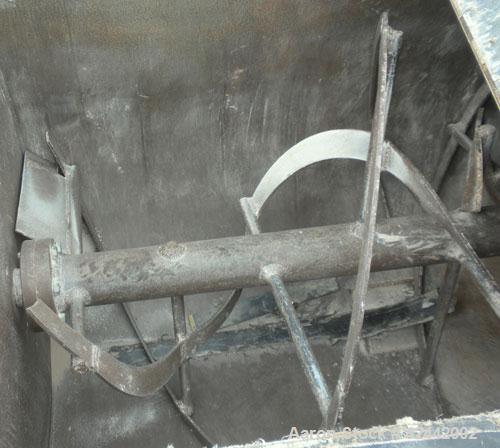 Used Champion Line Machinery Double Spiral Ribbon Blender, 113 cubic feet working capacity, carbon steel. Non-jacketed trough 48" wide x 96" long x approximately 56" deep. 6" diameter shaft, inner ri...