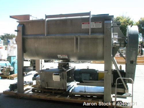 Used American Process double spiral ribbon blender, model DRB-120, 120 cubic foot working capacity, stainless steel. Non-jacketed trough 48" wide x 120" long x approximately 52" deep. 6" diameter sha...