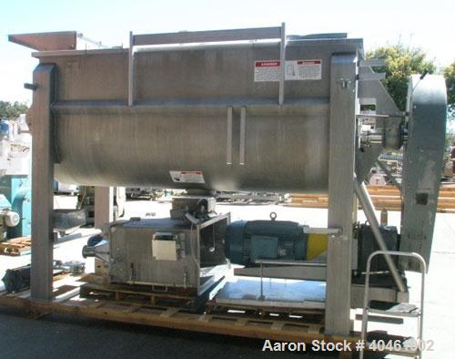 Used American Process double spiral ribbon blender, model DRB-120, 120 cubic foot working capacity, stainless steel. Non-jacketed trough 48" wide x 120" long x approximately 52" deep. 6" diameter sha...