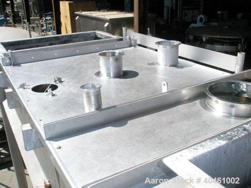 Used American Process double spiral ribbon blender, model DRB-120, 120 cubic foot working capacity, stainless steel. Non-jacketed trough 48" wide x 120" long x approximately 52" deep. 6" diameter sha...