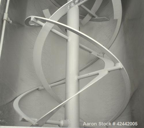 Used Falcon Manufacturing Double Spiral Ribbon Blender, model 504, 42 cubic feet working capacity, 304 stainless steel. Non-Jacketed trough 31-1/2" wide x 84" long x approximately 34" deep. 4" Diamet...