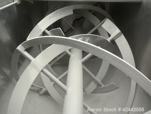 Used Falcon Manufacturing Double Spiral Ribbon Blender, model 504, 42 cubic feet working capacity, 304 stainless steel. Non-Jacketed trough 31-1/2" wide x 84" long x approximately 34" deep. 4" Diamet...