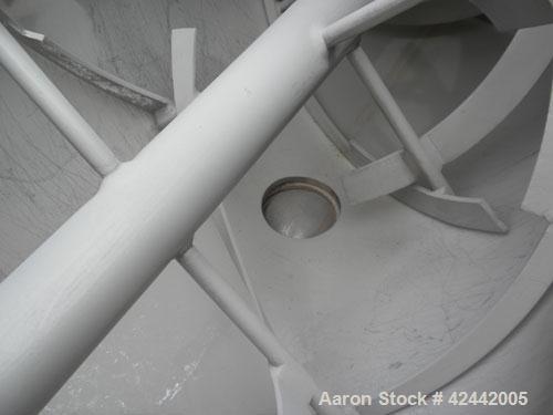Used Falcon Manufacturing Double Spiral Ribbon Blender, model 504, 42 cubic feet working capacity, 304 stainless steel. Non-Jacketed trough 31-1/2" wide x 84" long x approximately 34" deep. 4" Diamet...