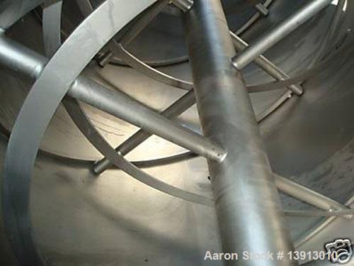 Used Hayes & Stolz Double Ribbon Blender. Manufactured 1998. 260 cubic foot, food grade stainless steel, 40 hp drive, 10 rpm at ribbon, covered top with (2) 7" and (2) 25" square inlets. Approximatel...
