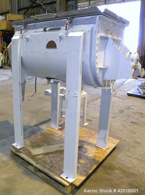 Used J.H. Day Double Spiral Ribbon Blender, model C, 10.8 cubic feet working capacity (12.5 total), 304 stainless steel. Carbon steel jacketed trough 21" wide x 48" long x approximately 24" deep, rat...