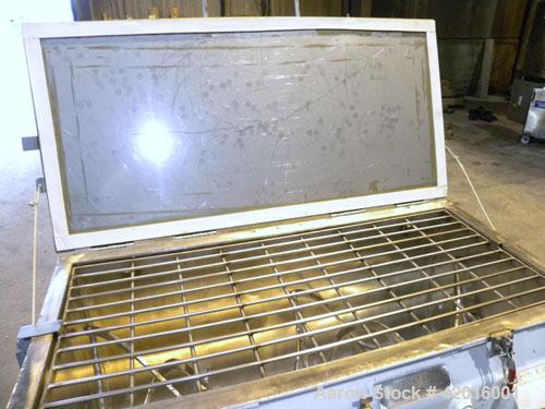 Used J.H. Day Double Spiral Ribbon Blender, model C, 10.8 cubic feet working capacity (12.5 total), 304 stainless steel. Carbon steel jacketed trough 21" wide x 48" long x approximately 24" deep, rat...