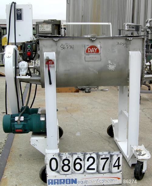 USED: J H Day double spiral ribbon blender, 10.8 cubic feet working capacity, 12.5 total, 304 stainless steel. Non-jacketed trough 21" wide x 48" long x approx 24" deep. 2" diameter shaft, inner ribb...
