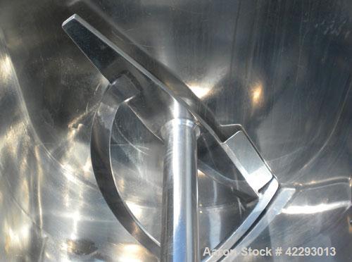 Used J.H. Day Double Spiral Ribbon Blender, model F, 54 cubic feet working capacity (59 total), 316 stainless steel. Jacketed trough 34" wide x 90" long x approximately 40" deep, rated 14.9 psi. 304 ...