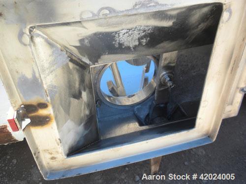 Used J.H. Day Double Spiral Ribbon Blender, Model G, 62.5 cubic feet working capacity (69 total), 304 stainless steel. Non-jacketed trough 36" wide x96" long x approximately 39" deep. 4" Diameter sha...
