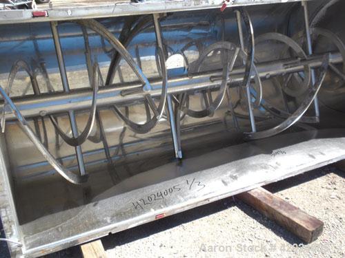 Used J.H. Day Double Spiral Ribbon Blender, Model G, 62.5 cubic feet working capacity (69 total), 304 stainless steel. Non-jacketed trough 36" wide x96" long x approximately 39" deep. 4" Diameter sha...