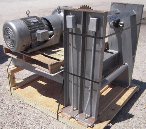 Used J.H. Day Double Spiral Ribbon Blender, 80 cubic feet working capacity, 93 total, 304 stainless steel. Non-jacketed trough 40" wide x 96" long x approximately 47" deep. 4" diameter shaft, inner r...