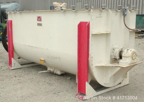 Used J.H. Day Double Spiral Ribbon Blender, 120 cubic feet working capacity. 304 stainless steel clad; carbon steel outside.  Non-jacketed trough 44" wide x 120" long x approximately 52" deep. 4-1/2"...