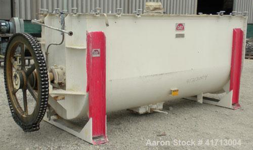 Used J.H. Day Double Spiral Ribbon Blender, 120 cubic feet working capacity. 304 stainless steel clad; carbon steel outside.  Non-jacketed trough 44" wide x 120" long x approximately 52" deep. 4-1/2"...
