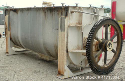 Used J.H. Day Double Spiral Ribbon Blender, 120 cubic feet working capacity. 304 stainless steel clad; carbon steel outside.  Non-jacketed trough 44" wide x 120" long x approximately 52" deep. 4-1/2"...