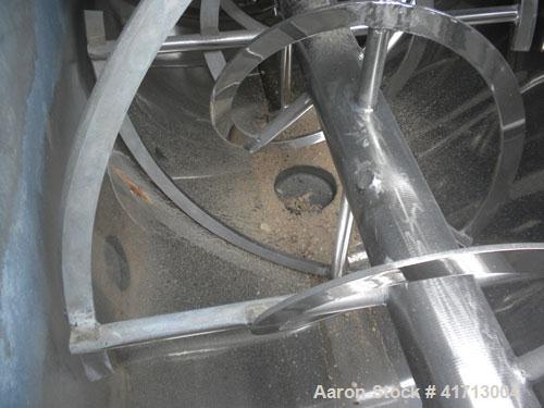 Used J.H. Day Double Spiral Ribbon Blender, 120 cubic feet working capacity. 304 stainless steel clad; carbon steel outside.  Non-jacketed trough 44" wide x 120" long x approximately 52" deep. 4-1/2"...