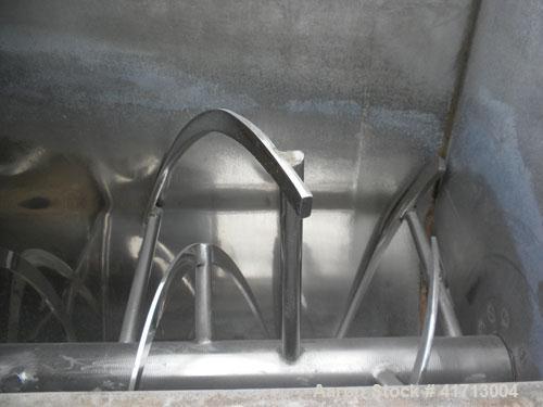 Used J.H. Day Double Spiral Ribbon Blender, 120 cubic feet working capacity. 304 stainless steel clad; carbon steel outside.  Non-jacketed trough 44" wide x 120" long x approximately 52" deep. 4-1/2"...