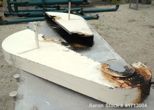 Used J.H. Day Double Spiral Ribbon Blender, 120 cubic feet working capacity. 304 stainless steel clad; carbon steel outside.  Non-jacketed trough 44" wide x 120" long x approximately 52" deep. 4-1/2"...
