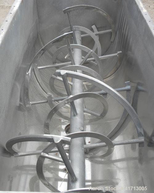 Used J.H. Day Double Spiral Ribbon Blender, 79 cubic root working capacity. 304 stainless steel clad; carbon steel outside.  Non-jacketed trough 40" wide x 96" long x approximately 47" deep. 4-1/4" d...
