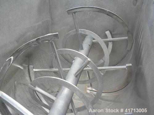 Used J.H. Day Double Spiral Ribbon Blender, 79 cubic root working capacity. 304 stainless steel clad; carbon steel outside.  Non-jacketed trough 40" wide x 96" long x approximately 47" deep. 4-1/4" d...