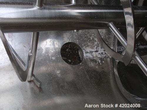 Used J.H. Day Double Spiral Ribbon Blender, 100 cubic feet working capacity (115 total), 304 stainless steel. Non-jacketed trough 40" wide x 120" long. 10" center bottom outlet. Driven by a 60 hp, 3/...