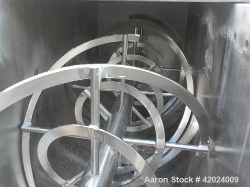 Used J.H. Day Double Spiral Ribbon Blender, 100 Cubic Feet Working Capacity (115 Total), 304 Stainless Steel. Non-Jacketed trough 40" wide x 120" long x approximately 48" deep. 5" Diameter shaft, inn...