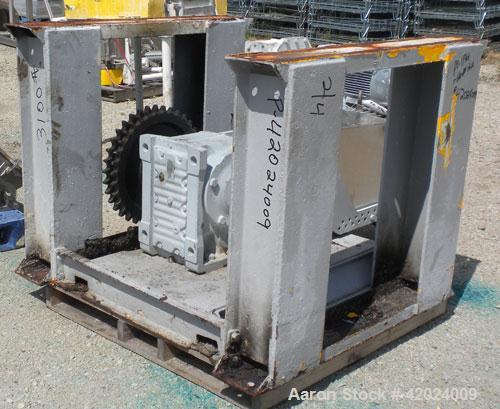 Used J.H. Day Double Spiral Ribbon Blender, 100 Cubic Feet Working Capacity (115 Total), 304 Stainless Steel. Non-Jacketed trough 40" wide x 120" long x approximately 48" deep. 5" Diameter shaft, inn...