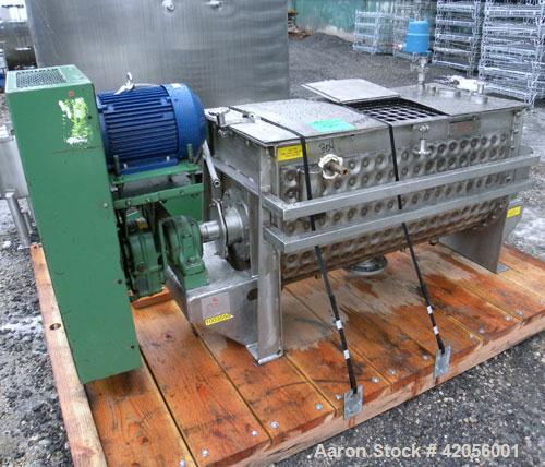 Used J.H. Day Paddle Mixer, 10.8 cubic feet working capacity, 12.5 total, 304 stainless steel. Dimple jacketed trough 21" wide x 48" long x approximately 24" deep, rated 125 psi at 353 deg F. 3" diam...