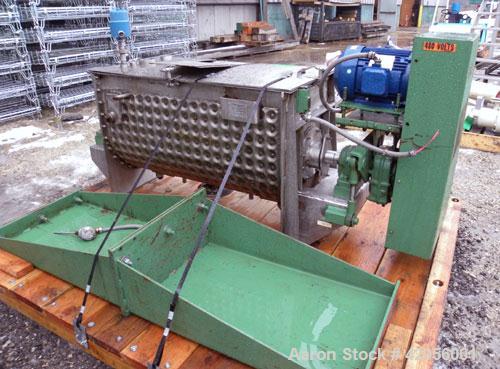 Used J.H. Day Paddle Mixer, 10.8 cubic feet working capacity, 12.5 total, 304 stainless steel. Dimple jacketed trough 21" wide x 48" long x approximately 24" deep, rated 125 psi at 353 deg F. 3" diam...
