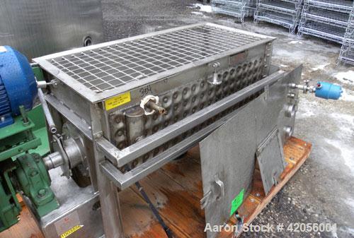 Used J.H. Day Paddle Mixer, 10.8 cubic feet working capacity, 12.5 total, 304 stainless steel. Dimple jacketed trough 21" wide x 48" long x approximately 24" deep, rated 125 psi at 353 deg F. 3" diam...