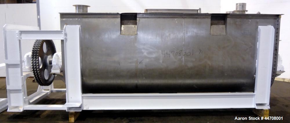 Used J.H. Day Double Spiral Ribbon Blender, 185 cubic feet working capacity, 304 stainless steel. Non-jacketed trough 50" wide x 144" long x approximately 59" deep. 6" Diameter shaft, inner ribbon 2"...