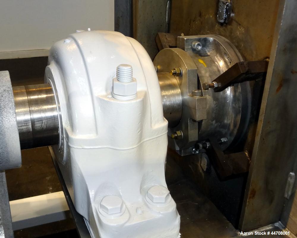 Used J.H. Day Double Spiral Ribbon Blender, 185 cubic feet working capacity, 304 stainless steel. Non-jacketed trough 50" wide x 144" long x approximately 59" deep. 6" Diameter shaft, inner ribbon 2"...