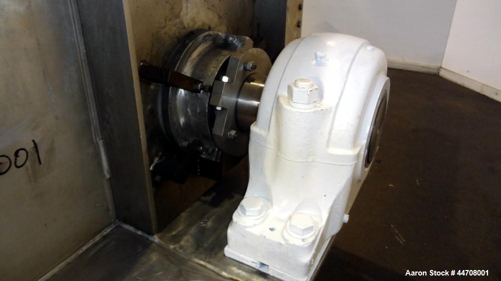 Used J.H. Day Double Spiral Ribbon Blender, 185 cubic feet working capacity, 304 stainless steel. Non-jacketed trough 50" wide x 144" long x approximately 59" deep. 6" Diameter shaft, inner ribbon 2"...