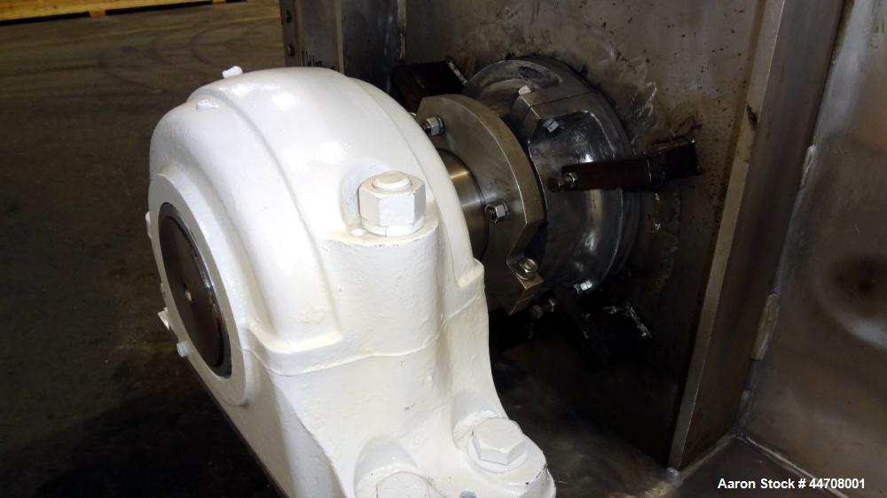 Used J.H. Day Double Spiral Ribbon Blender, 185 cubic feet working capacity, 304 stainless steel. Non-jacketed trough 50" wide x 144" long x approximately 59" deep. 6" Diameter shaft, inner ribbon 2"...