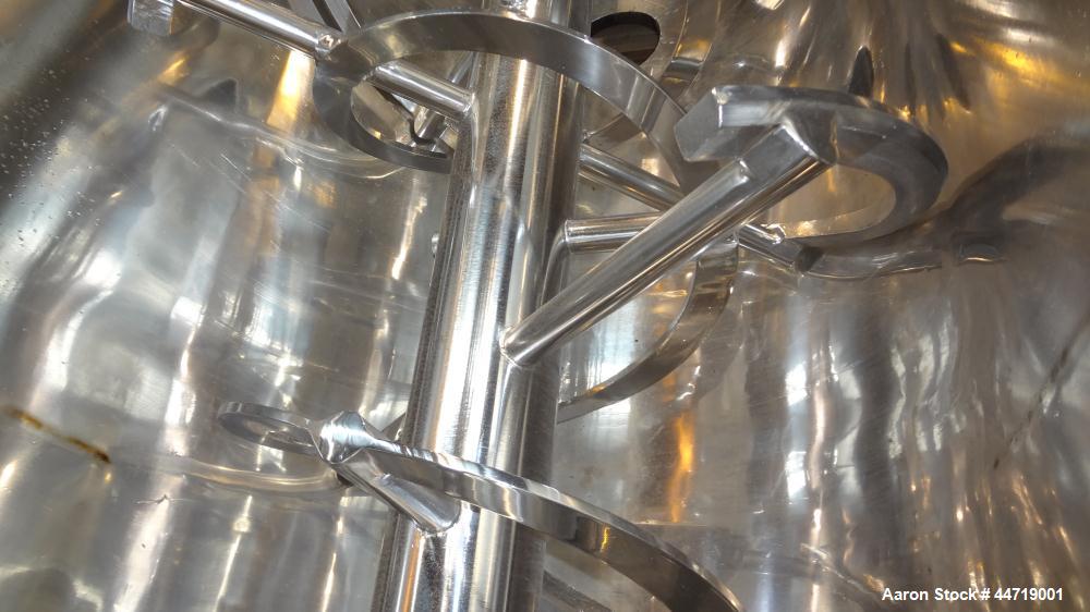 Used J.H. Day Double Spiral Ribbon Blender, 100 cubic feet working capacity (115 total), 304 stainless steel.  Non-Jacketed trough 40" wide x 120" long x approximately 47" deep.  6" Diameter shaft, i...