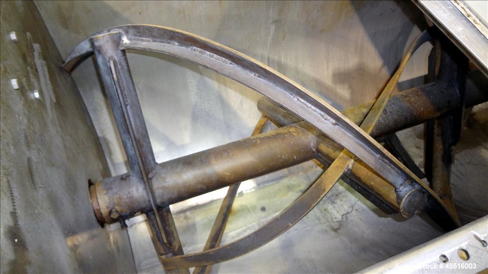 Used Double Spiral Ribbon Blender, 36 Cubic Feet Working Capacity.  304 Stainless steel non-jacketed trough 78" long x 30" wide x 32" deep.  Carbon steel 4" diameter shaft with inner ribbon 1.5" wide...