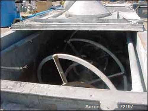 Used J.H. Day Ribbon Blender, 144 Cubic Foot Working Capacity, Carbon Steel. 44" Wide x 144" long jacketed trough. Double ribbon, outboard roller bearings, packing glands. Chain driven by a 30 hp gea...