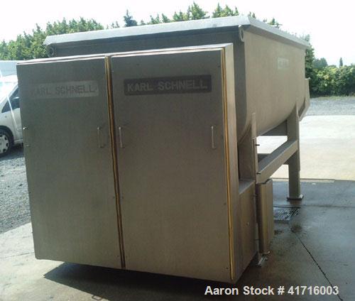 Used Karl Schnell Twin Shaft Ribbon Mixer. All stainless steel, capacity 1190 gallons (4,500 liters). Bowl dimensions 5'3" long x 9'5" wide x 3'3" deep (1600 mm long x 2900 mm wide x 1000 mm deep). (...