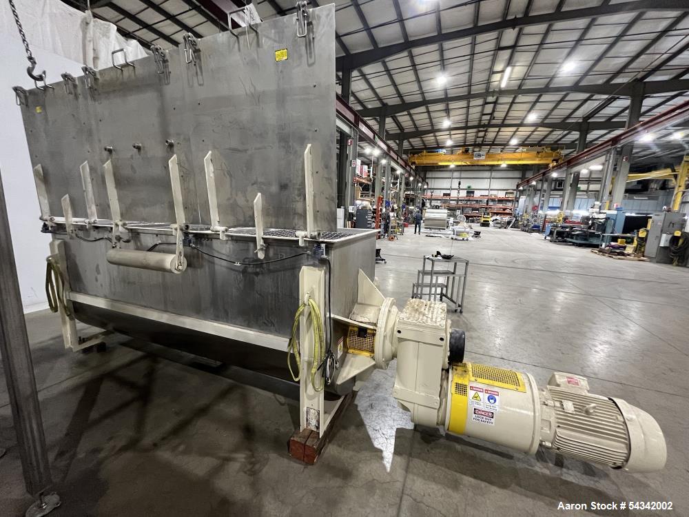 Used Littleford Double Ribbon Blender, approximately 100 cuft, 304 stainless steel. Sanitary Construction. Approximately 119-5/8" long x 40" wide x 50" deep trough. hinged covers with safety grate. 4...