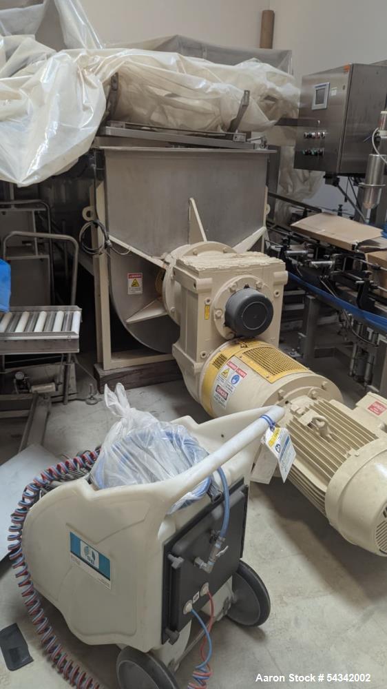 Used Littleford approximately 100 cuft stainless steel double ribbon blender.  Sanitary Construction.  Center bottom discharge.  Drive and covers.