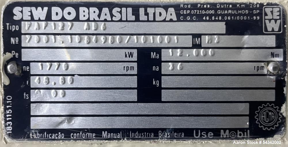 Used Littleford Double Ribbon Blender, approximately 100 cuft, 304 stainless steel. Sanitary Construction. Approximately 119-5/8" long x 40" wide x 50" deep trough. hinged covers with safety grate. 4...