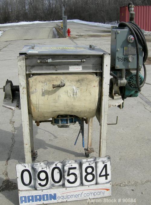 Used:Marion paddle mixer, model 1101, 4 cubic feet, 304 stainless steel.Dimpled jacketed trough 18" wide x 24" long x 21" deep, no rating. 2 3/8" diameter shaft with 4 bollt on paddles, 1 1/8" diamet...