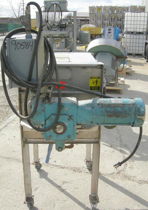 Used:Marion paddle mixer, model 1101, 4 cubic feet, 304 stainless steel.Dimpled jacketed trough 18" wide x 24" long x 21" deep, no rating. 2 3/8" diameter shaft with 4 bollt on paddles, 1 1/8" diamet...