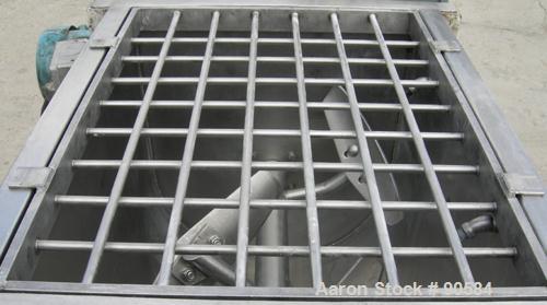 Used:Marion paddle mixer, model 1101, 4 cubic feet, 304 stainless steel.Dimpled jacketed trough 18" wide x 24" long x 21" deep, no rating. 2 3/8" diameter shaft with 4 bollt on paddles, 1 1/8" diamet...