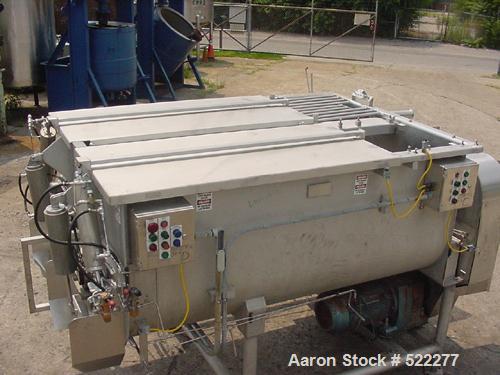 USED: Mepaco model 170 MD twin screw mixer/blender. 5,000 lb or 136 cu ft capacity. Equipped with pneumatically operated end discharge. The mix tub is 64" wide x 94" long x 43" high. The overall dime...